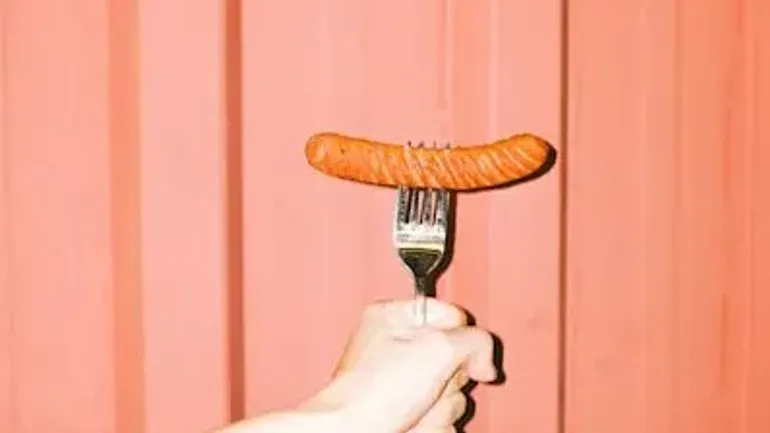 The physics of a sausage on a fork